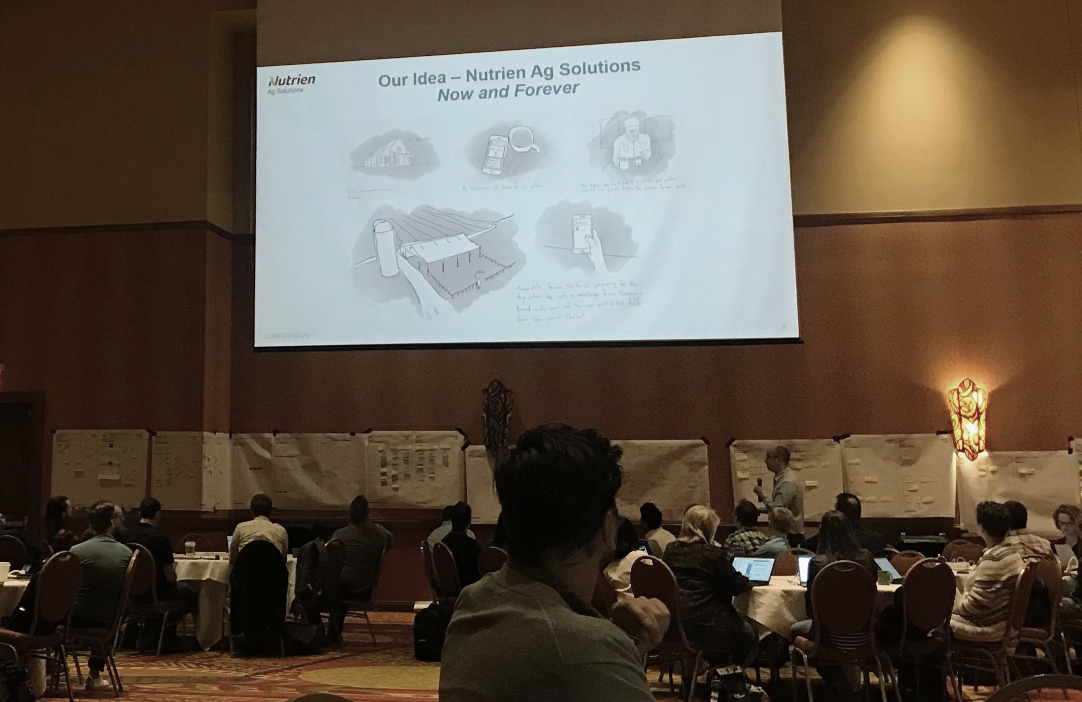 Presenting a UX vision — “Our Idea: Nutrien Ag Solutions, Now and Forever” — to a packed room at a company planning event.